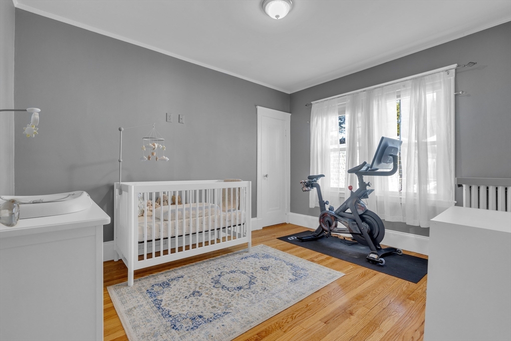 173 Train Street, Unit 1 Boston, MA 02122 - Photo 11 of 13 a view of a room with gym equipment