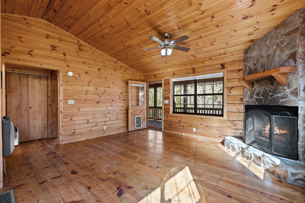 16 Dean Court Blue Ridge, GA 30513 - Photo 7 of 19 a view of an empty room with a window