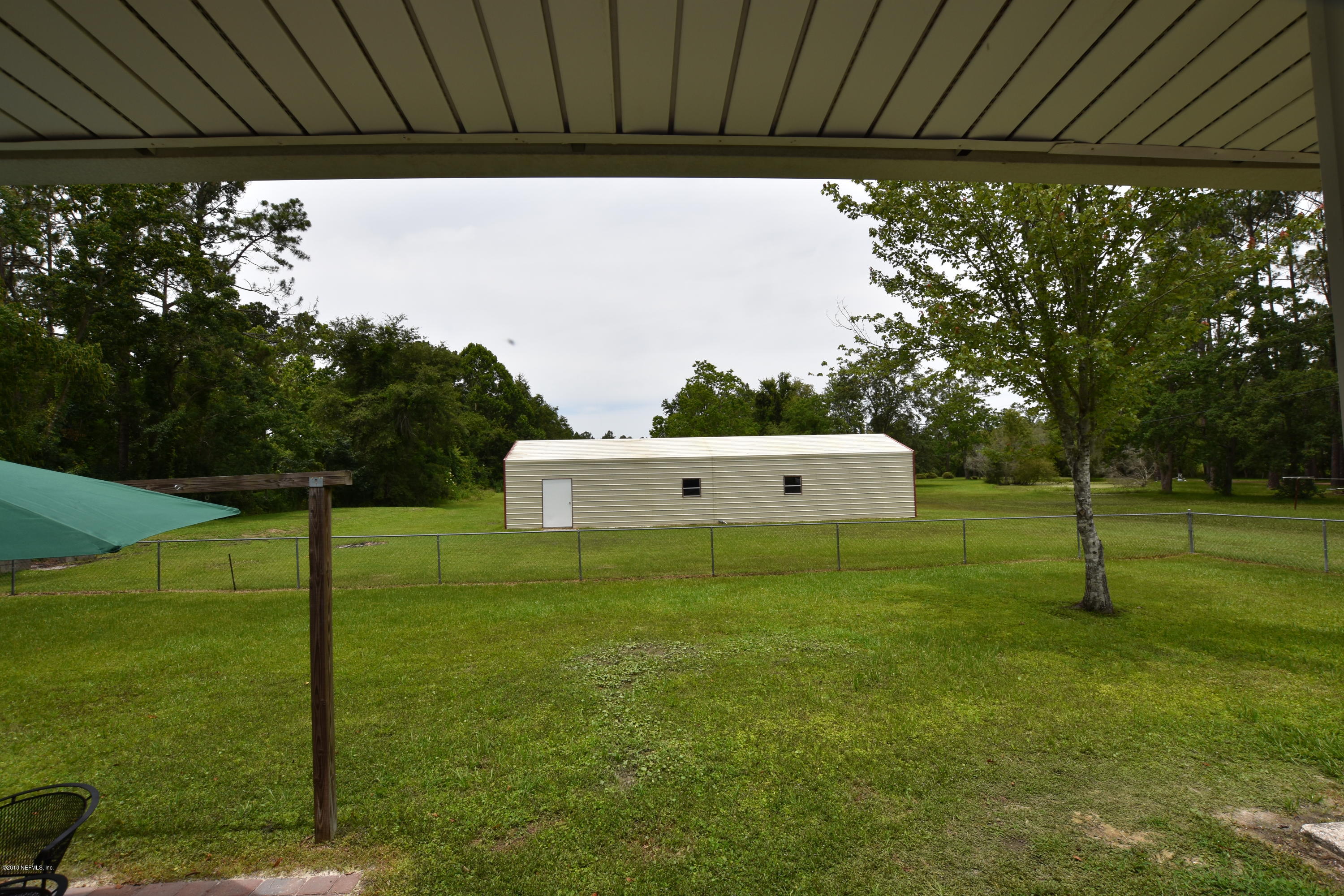 5139 Younis Road Jacksonville, FL 32218 - Photo 38 of 41 20x60 Garage/Storage Looking from House