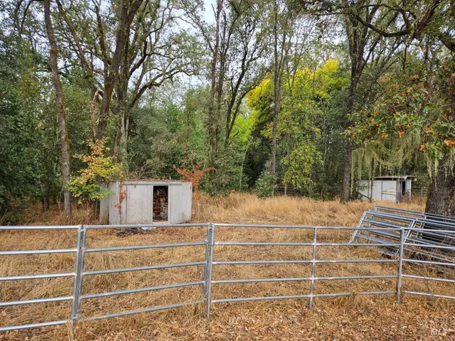 a view of a wooden fence