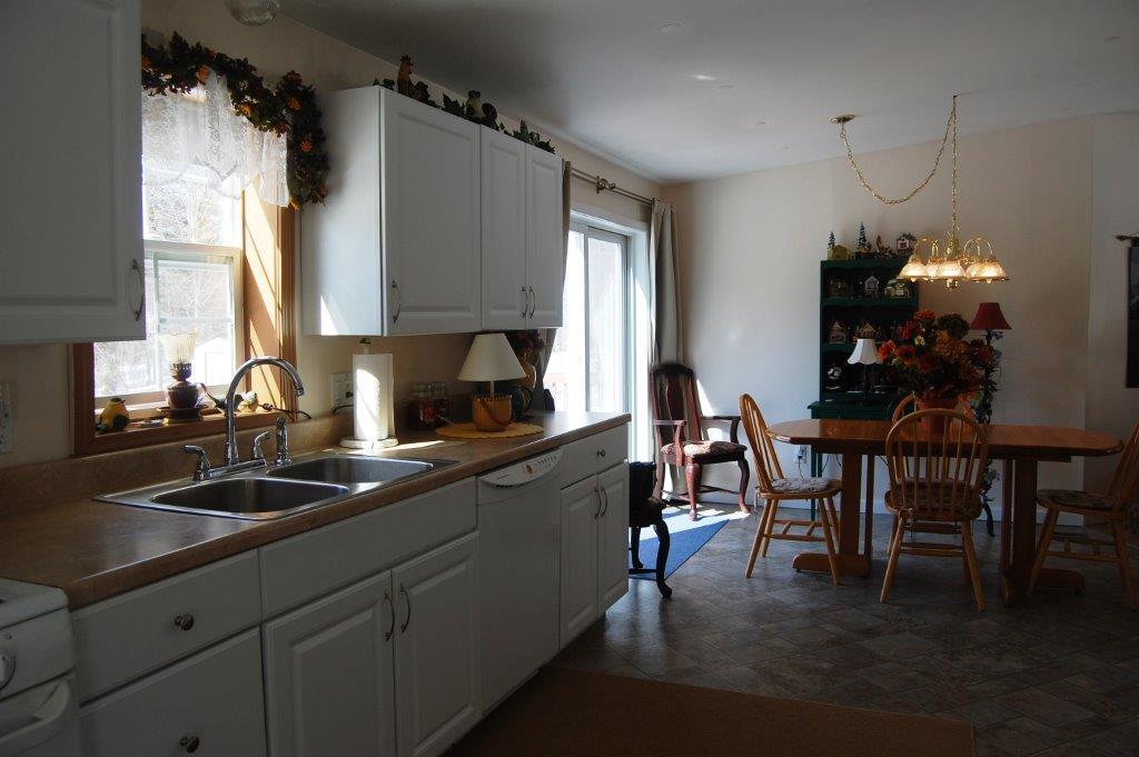 26 Tasker Road Augusta, ME 04330 - Photo 7 of 18 Eat In Kitchen into Dining