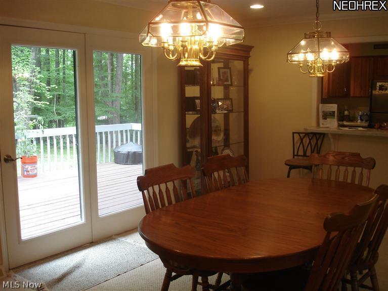 16532 Haskins Road Bainbridge, OH 44023 - Photo 14 of 19 LARGE DINING WITH CONVENIENT ACCESS TO THE PRIVATE DECK OVERLOOKING THE WOODS