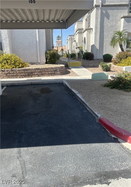 3150 North Soft Breezes Drive, Unit 1033 Las Vegas, NV 89128 - Photo 7 of 14 View of uncovered parking lot