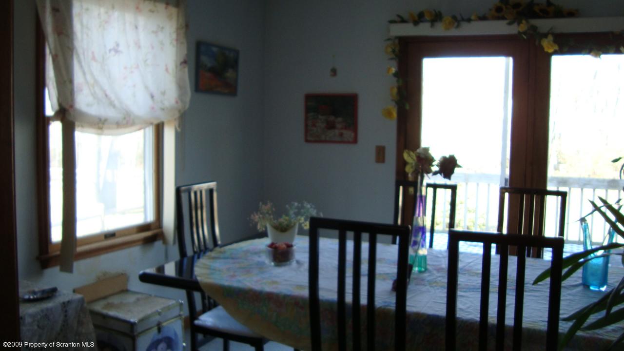 228 Winona Road Mount Pocono, PA 18344 - Photo 5 of 13 a view of a livingroom with furniture
