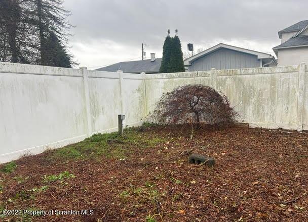 410 Riley Street Old Forge, PA 18518 - Photo 11 of 11 a view of a tiny house with a yard