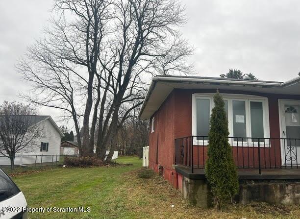 410 Riley Street Old Forge, PA 18518 - Photo 2 of 11 front view of a house with a yard