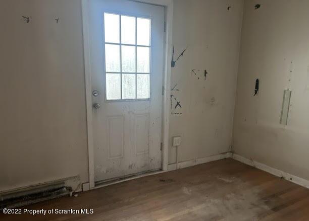 410 Riley Street Old Forge, PA 18518 - Photo 7 of 11 an empty room with a window