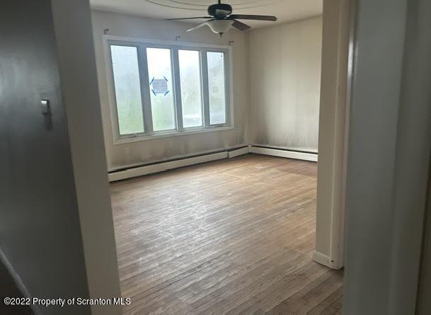 410 Riley Street Old Forge, PA 18518 - Photo 8 of 11 a view of an empty room with a window