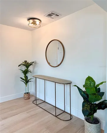 a vase of flowers sitting on a table