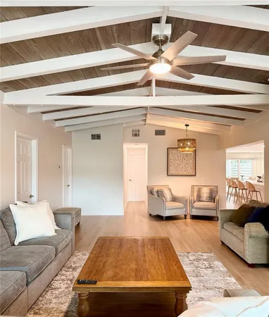 a living room with furniture and a couch