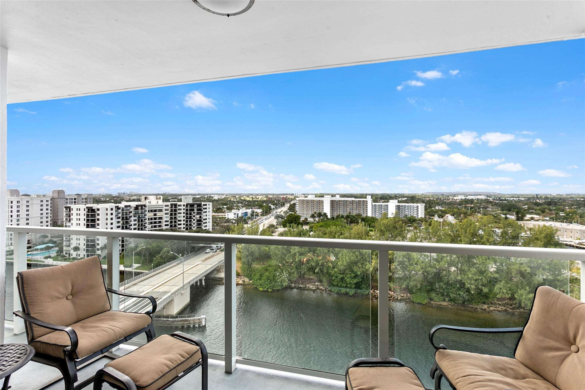 1401 North Riverside Drive, Unit PH 1502 Pompano Beach, FL 33062 - Photo 14 of 32 a view of a chairs in a balcony
