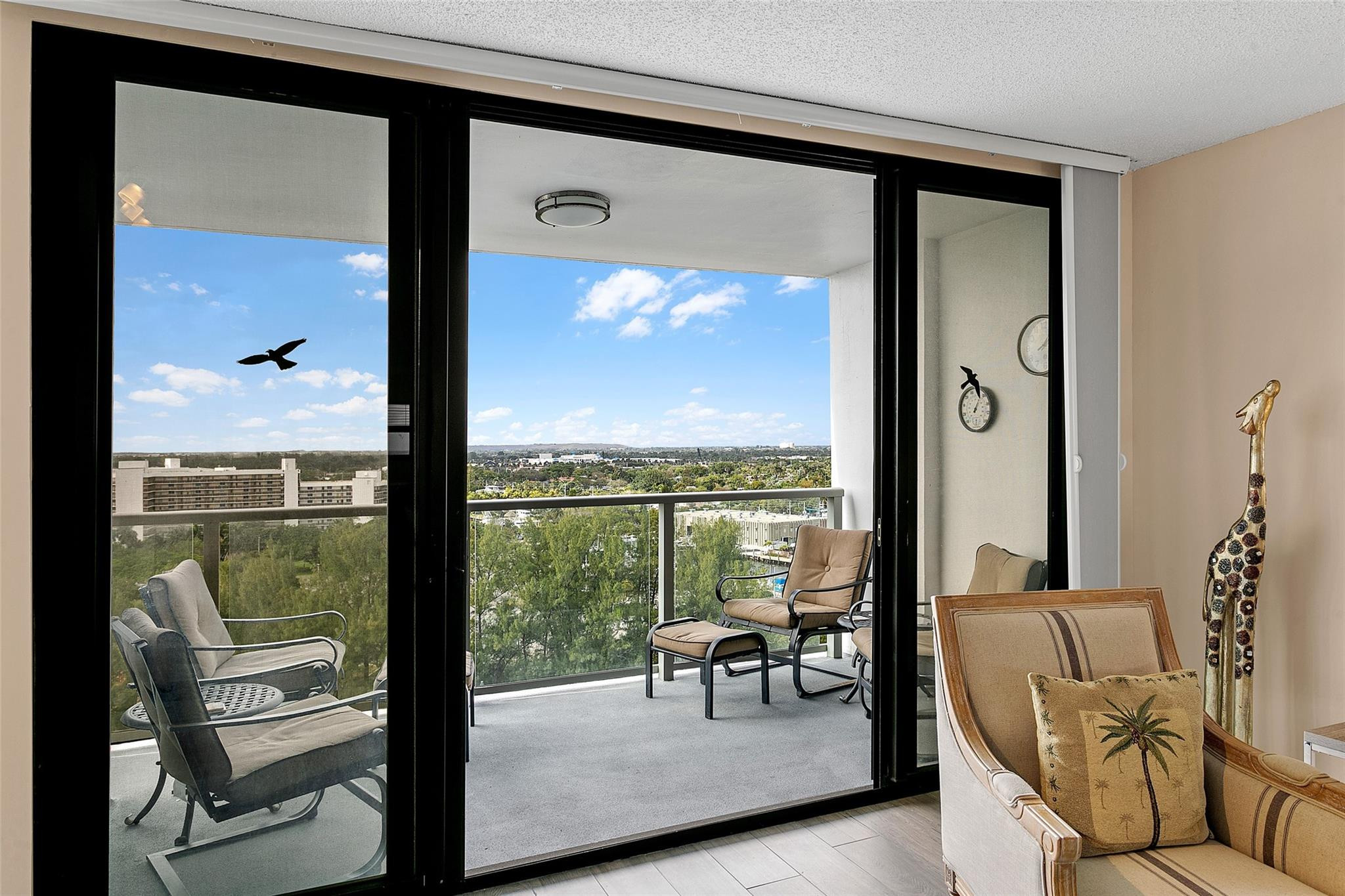 1401 North Riverside Drive, Unit PH 1502 Pompano Beach, FL 33062 - Photo 22 of 32 a view of a room with chairs and lounge chair