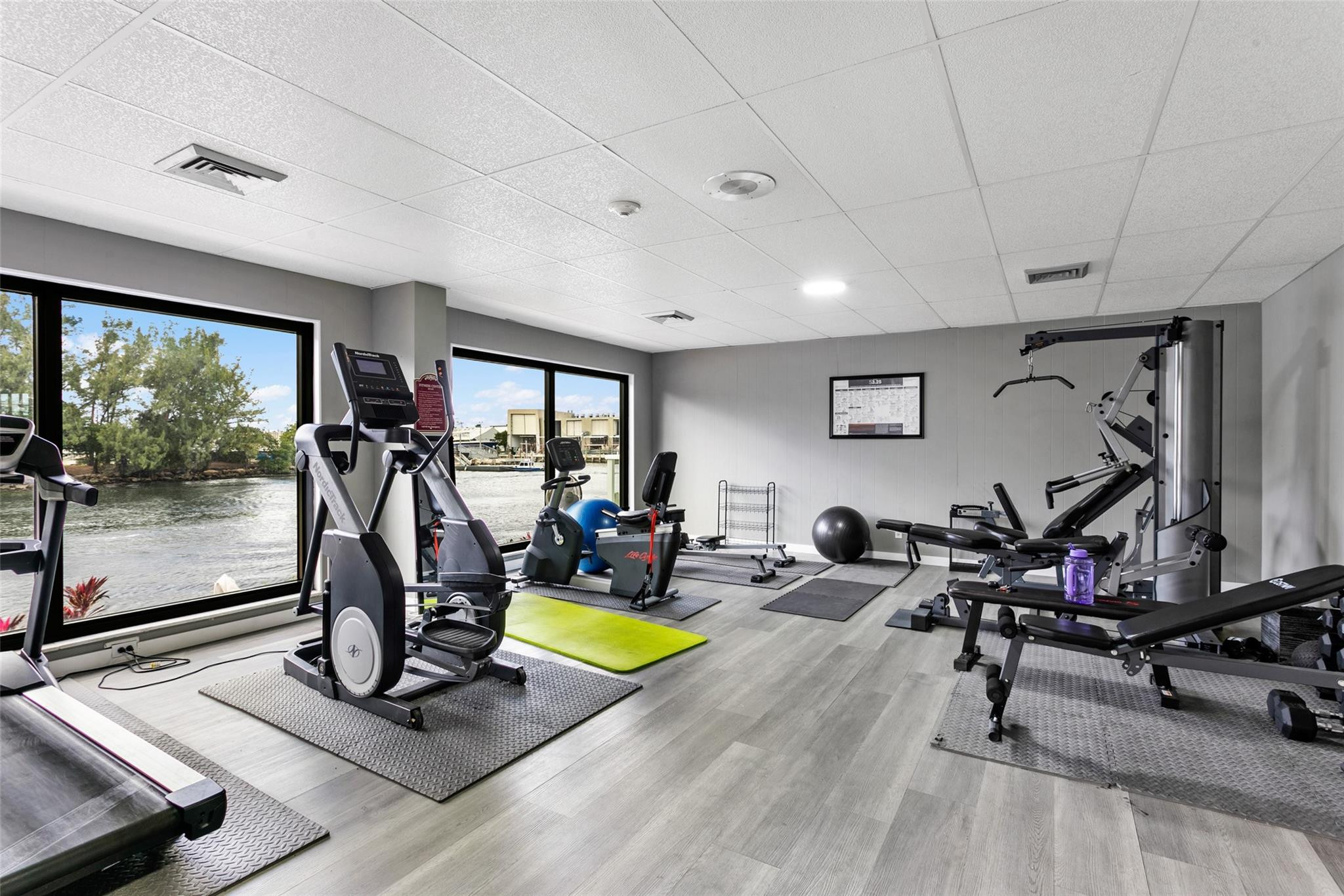 1401 North Riverside Drive, Unit PH 1502 Pompano Beach, FL 33062 - Photo 27 of 32 a view of a room with gym equipment