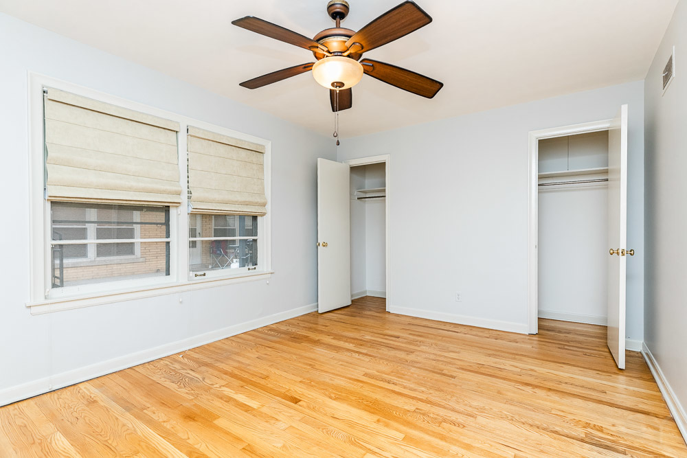 7221 Division Street, Unit 4 River Forest, IL 60305 - Photo 12 of 17 a view of an empty room with a window and a ceiling fan