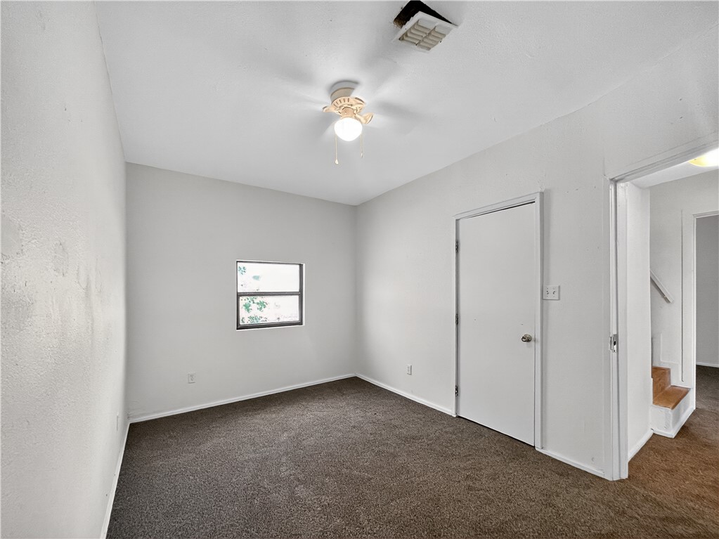 4391 Piper Cub Street Robstown, TX 78380 - Photo 15 of 40 a view of a livingroom with a ceiling fan and window