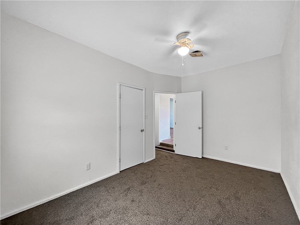 4391 Piper Cub Street Robstown, TX 78380 - Photo 16 of 40 a view of a livingroom with a ceiling fan and window