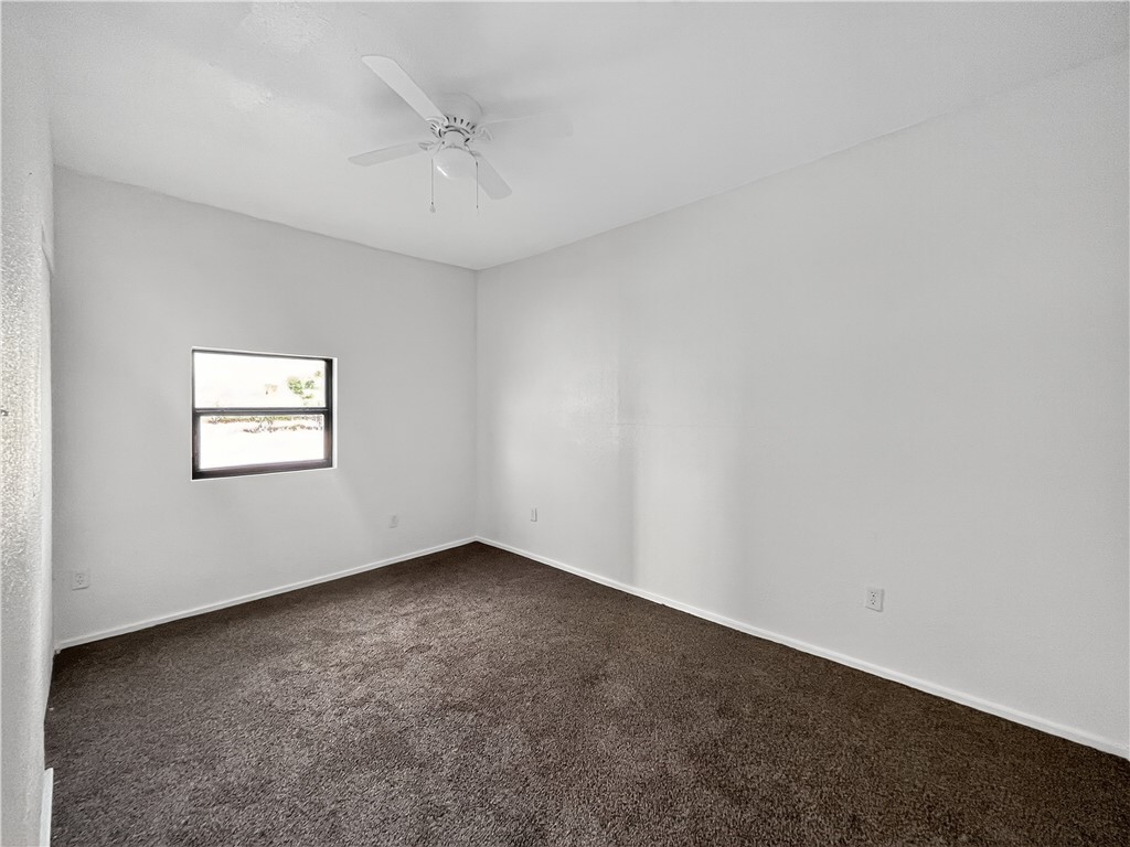 4391 Piper Cub Street Robstown, TX 78380 - Photo 18 of 40 an empty room with a window