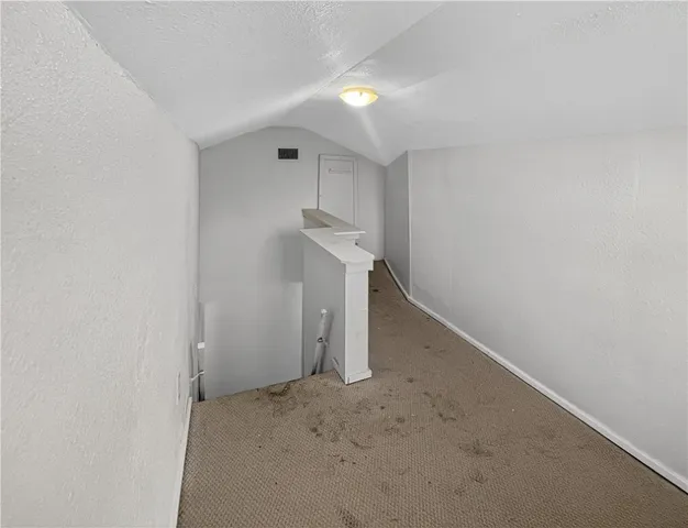 an empty room with a natural light