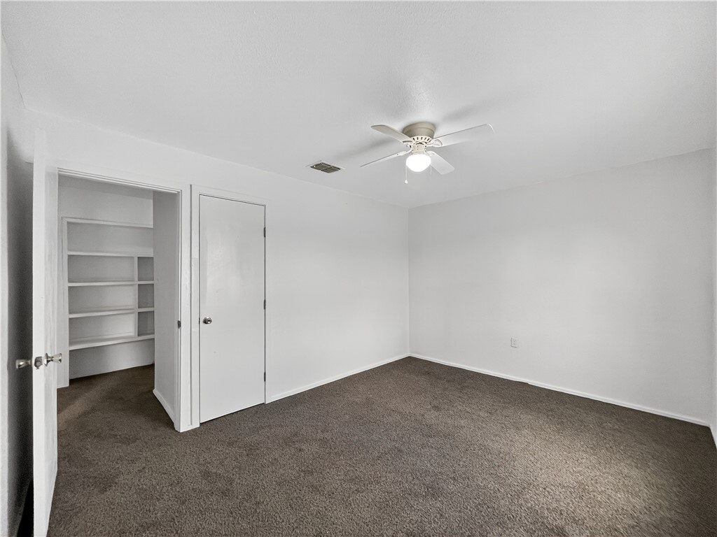 4391 Piper Cub Street Robstown, TX 78380 - Photo 38 of 40 a view of an empty room with a ceiling fan