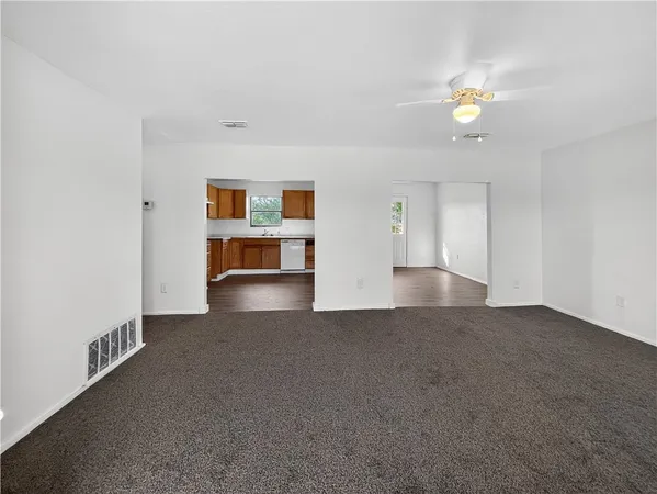 a view of a livingroom with a staircase