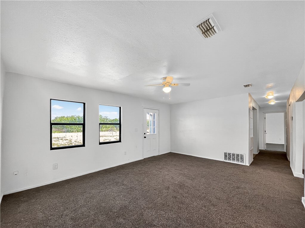 4391 Piper Cub Street Robstown, TX 78380 - Photo 8 of 40 an empty room with windows and closet