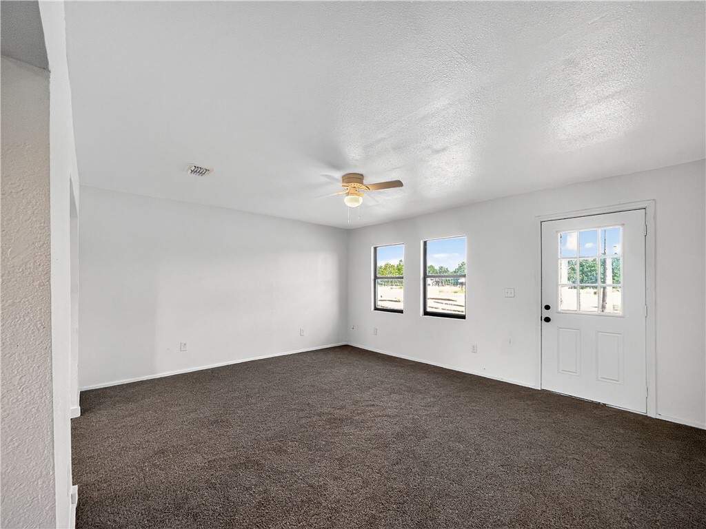 4391 Piper Cub Street Robstown, TX 78380 - Photo 9 of 40 an empty room with windows and closet