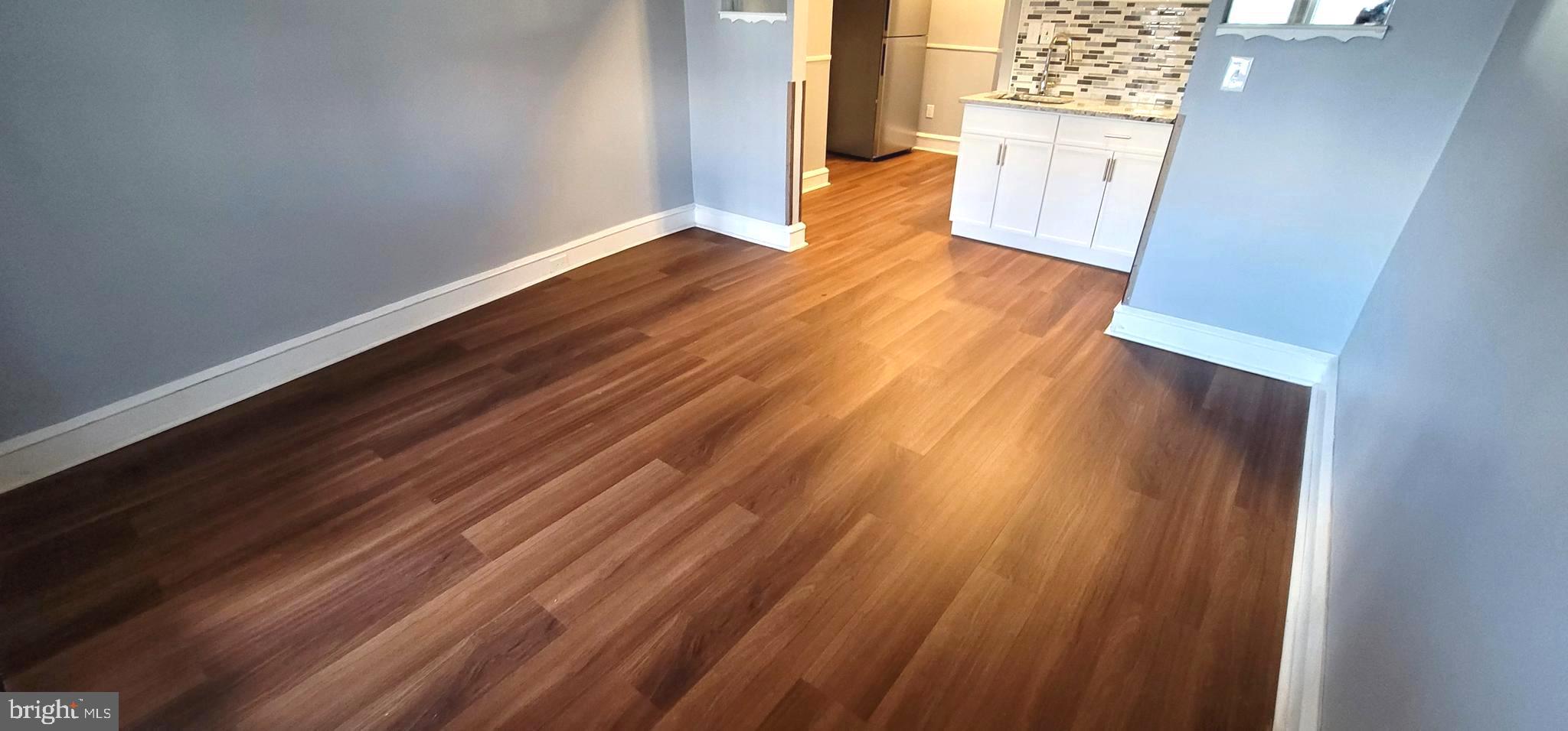 4922 North 8th Street Philadelphia, PA 19120 - Photo 3 of 21 a view of empty room with wooden floor