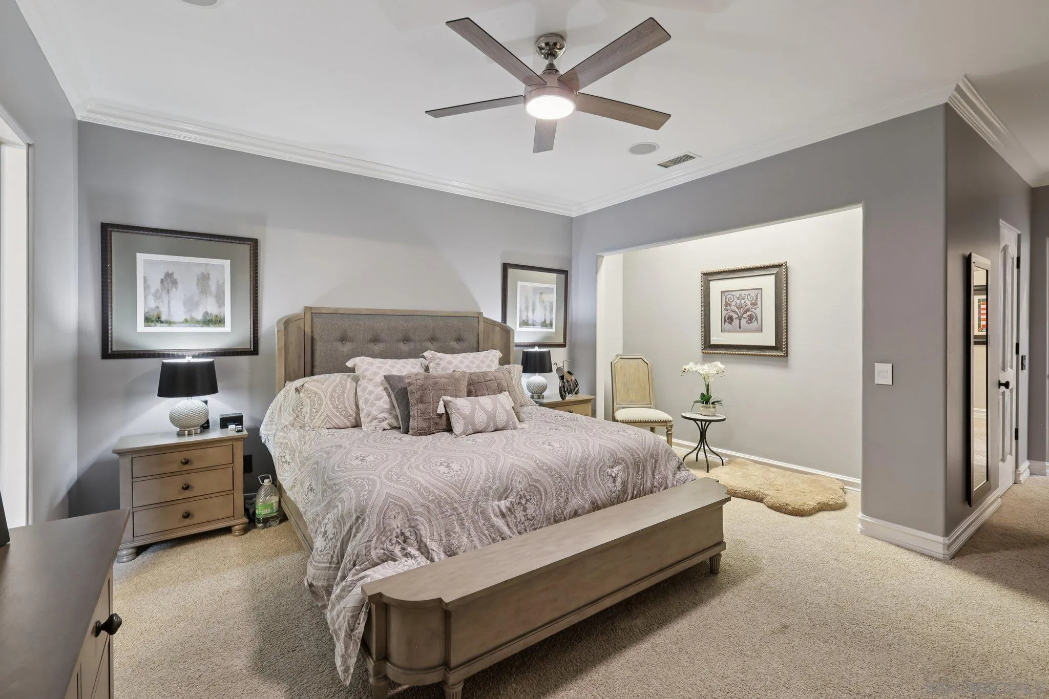 13371 Summit Circle Poway, CA 92064 - Photo 34 of 75 a bedroom with a bed couch and painting on the wall