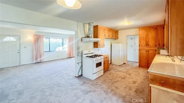 a view of a kitchen with a sink cabinets and a kitchen