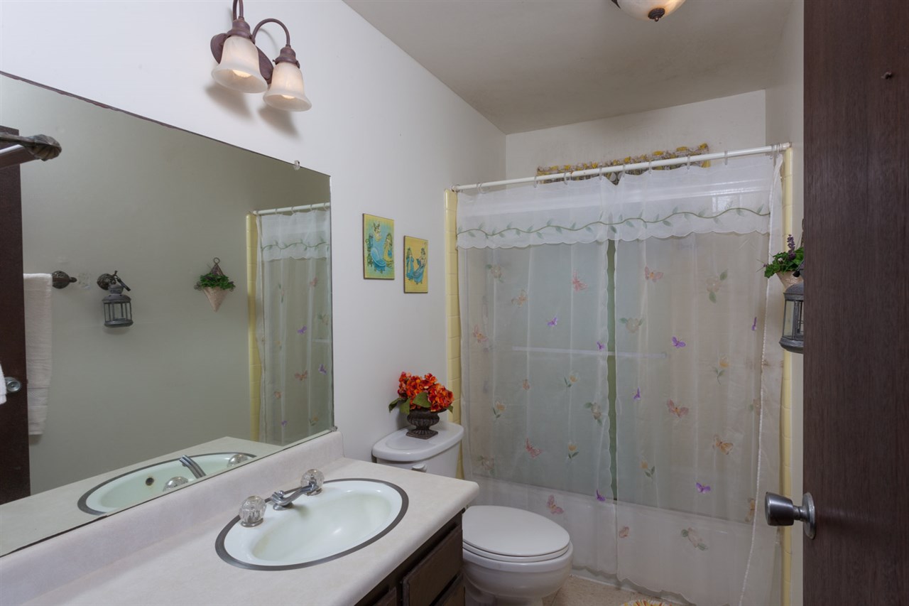 605 Kaupakalua Road Haiku, HI 96708 - Photo 22 of 30 a bathroom with a sink toilet and shower