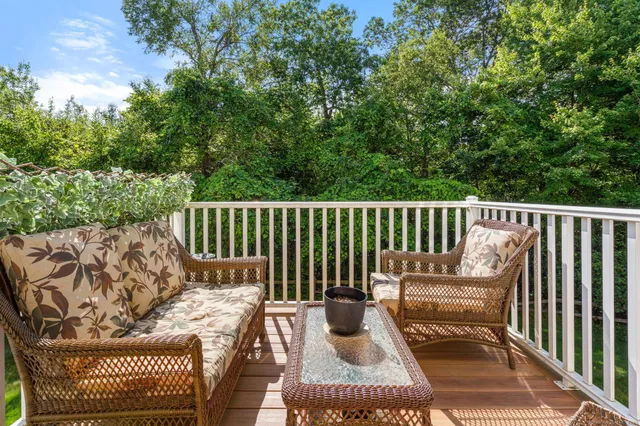 a view of balcony with furniture