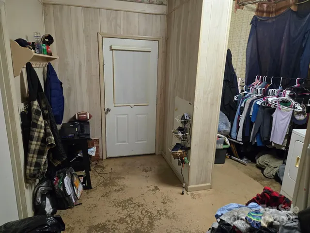 a view of a closet with storage