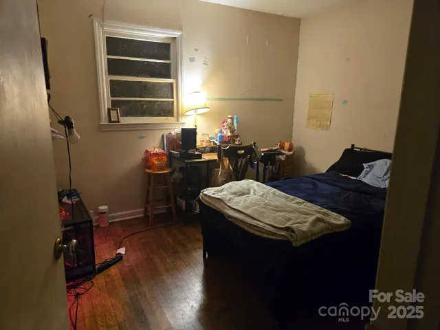 a bathroom with a granite countertop sink a vanity and a mirror