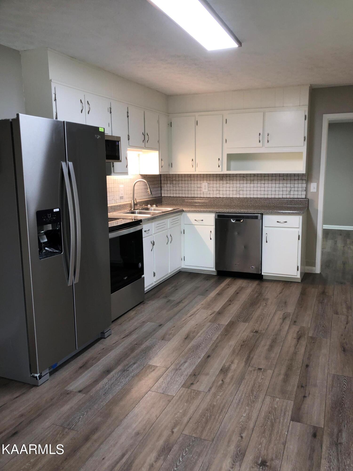 2830 Taylors Chapel Road Crossville, TN 38572 - Photo 4 of 20 kitchen view to laundry room