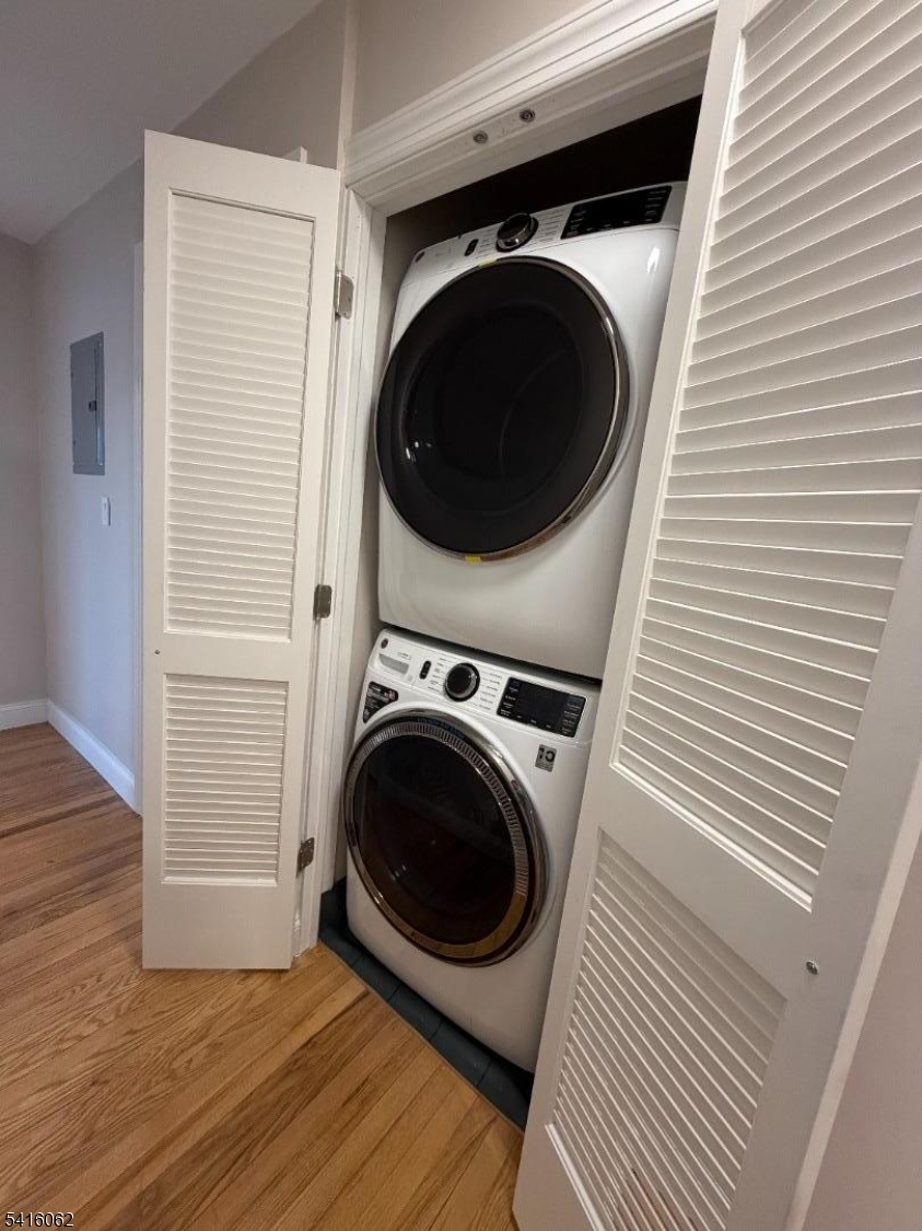 93 Centre Street Nutley, NJ 07110 - Photo 8 of 8 a view of a hallway with washer and dryer