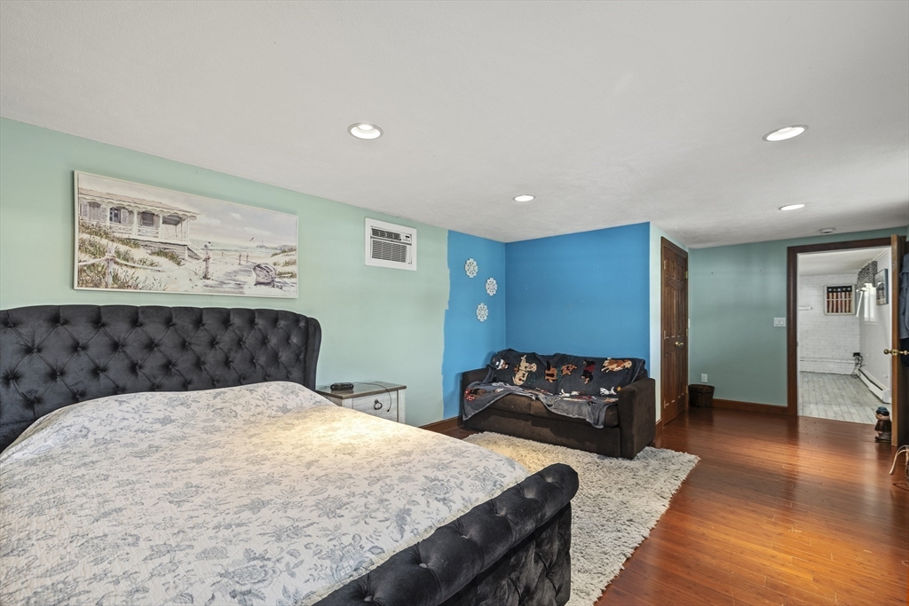 21 Reading Terrace Reading, MA 01867 - Photo 13 of 42 a bedroom with a bed and dresser