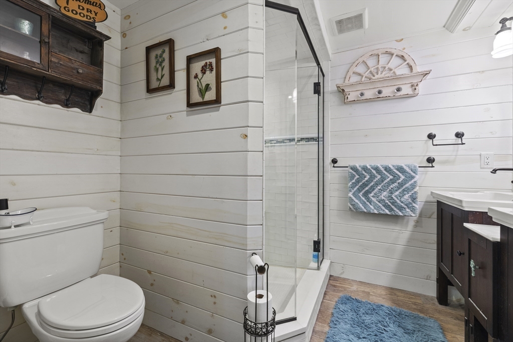 21 Reading Terrace Reading, MA 01867 - Photo 16 of 42 a bathroom with a toilet and a shower