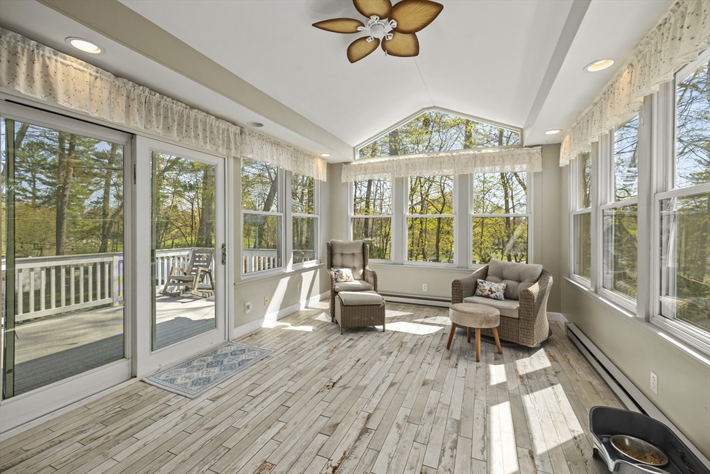 21 Reading Terrace Reading, MA 01867 - Photo 32 of 42 a living room with furniture and a large window
