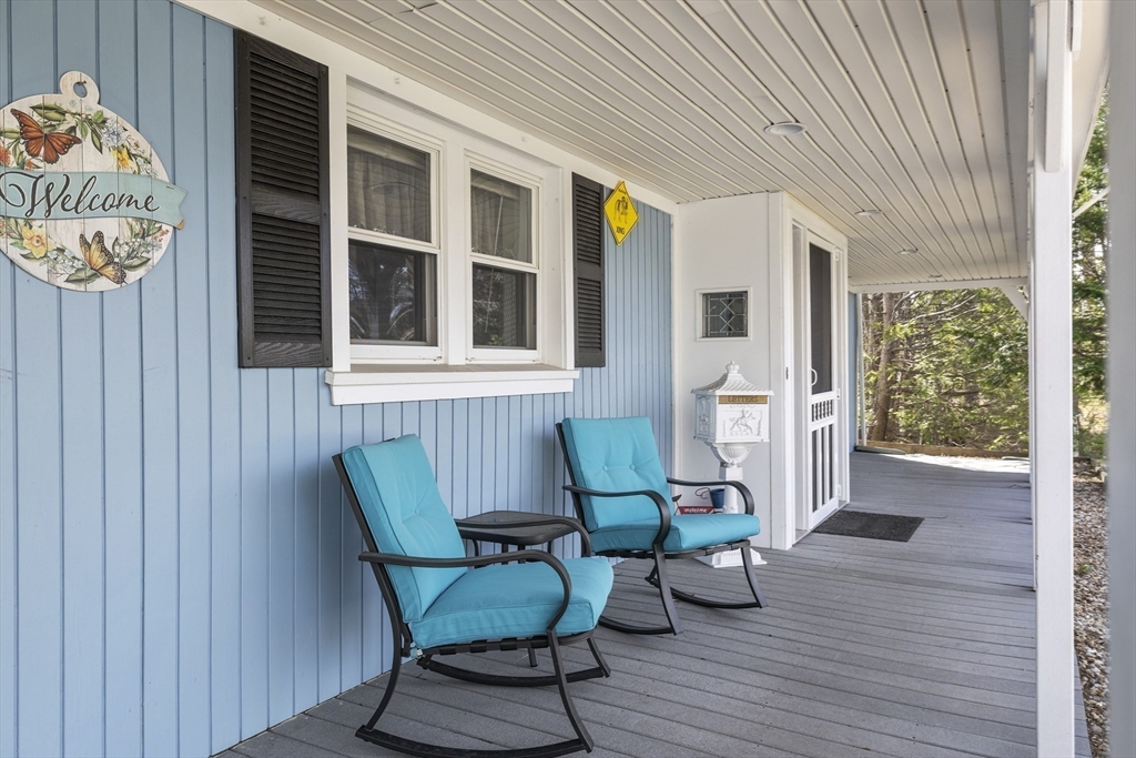21 Reading Terrace Reading, MA 01867 - Photo 8 of 42 a view of a house with backyard and sitting area