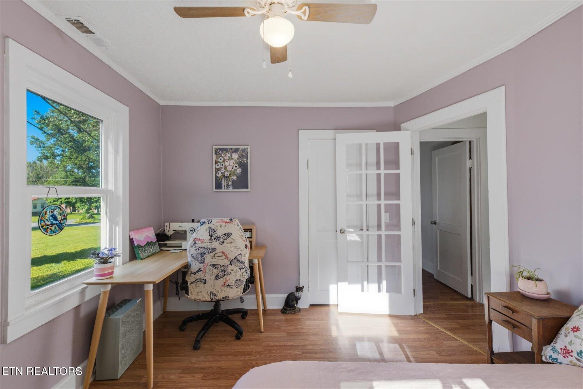 159 Mill Street Delano, TN 37325 - Photo 14 of 22 a workspace with wooden floor and a window