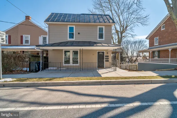 a view of a house with a terrace