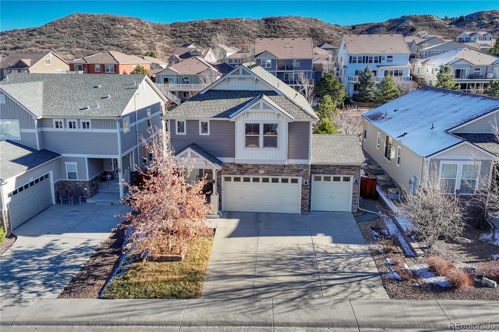 3359 Starry Night Loop Castle Rock, CO 80109 - Photo 1 of 47 a front view of a house with a yard