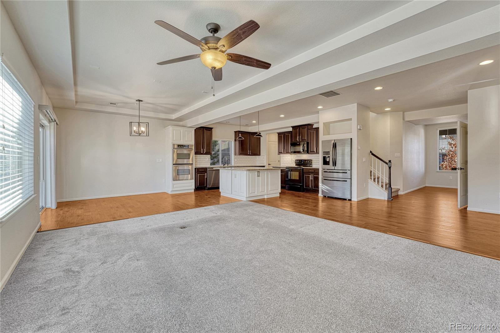 3359 Starry Night Loop Castle Rock, CO 80109 - Photo 15 of 47 a view of empty room with wooden floor and window