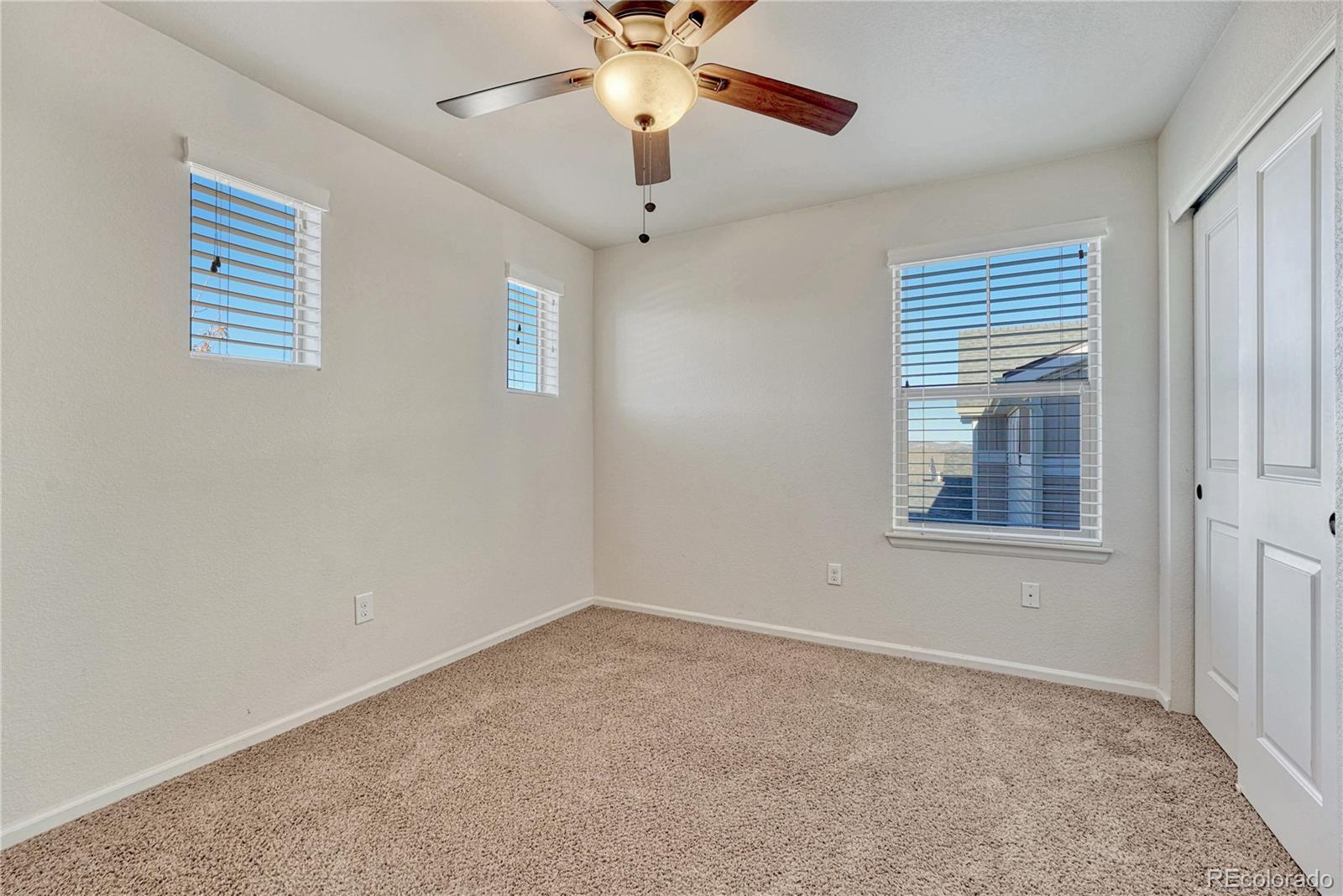 3359 Starry Night Loop Castle Rock, CO 80109 - Photo 30 of 47 a view of an empty room with a window