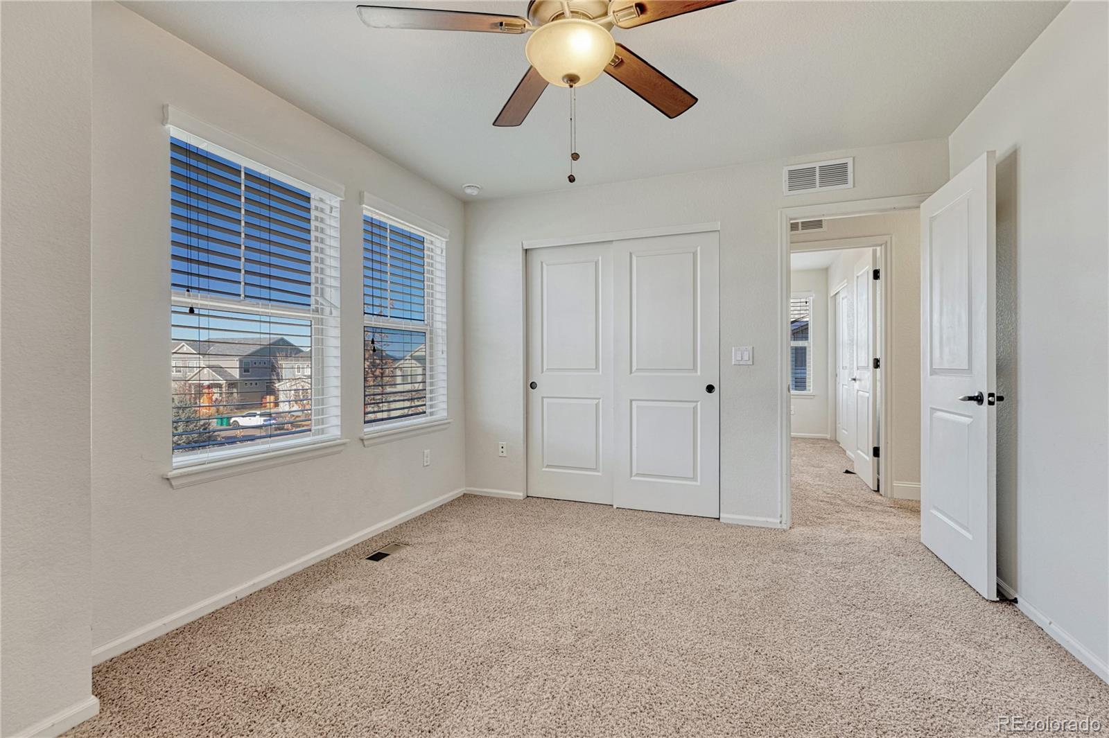 3359 Starry Night Loop Castle Rock, CO 80109 - Photo 33 of 47 a view of an empty room with window and closet area