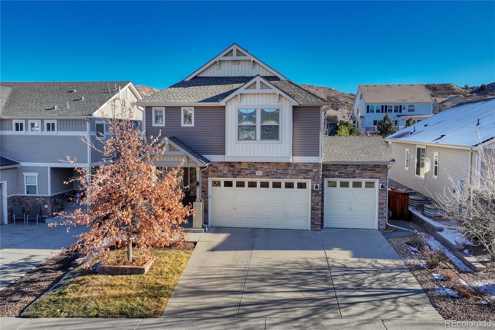 3359 Starry Night Loop Castle Rock, CO 80109 - Photo 7 of 15 a front view of a house with a yard
