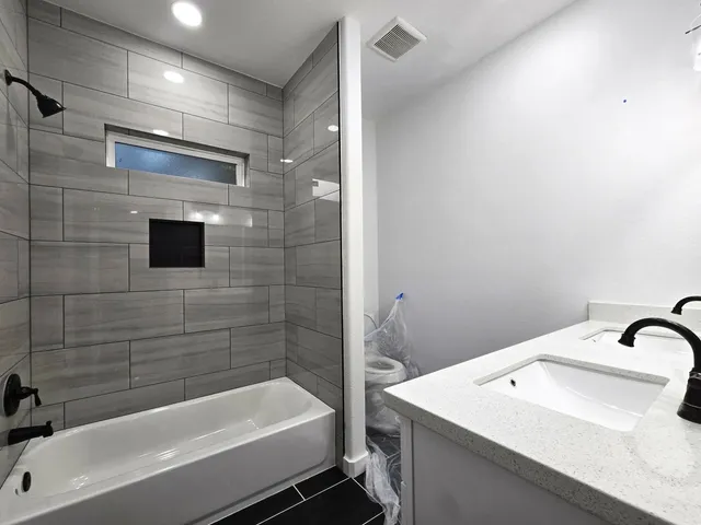a view of hallway with wooden floor