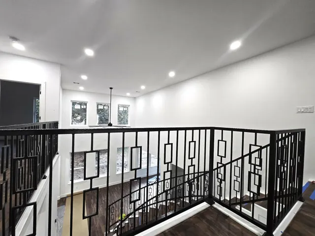 a view of staircase with lots of wooden floor