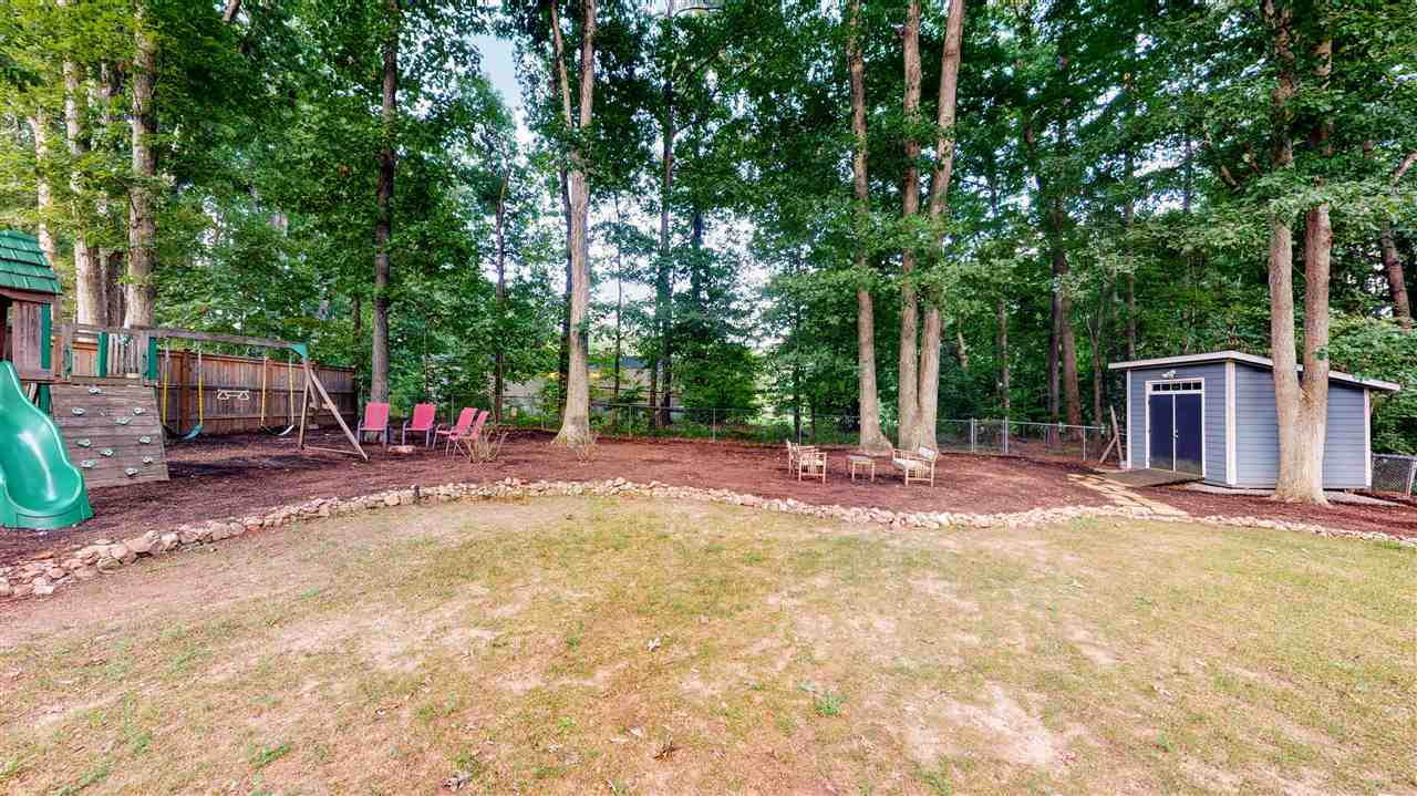4212 Windsor Place Raleigh, NC 27609 - Photo 26 of 30 Rear Yard with shed and play structure
