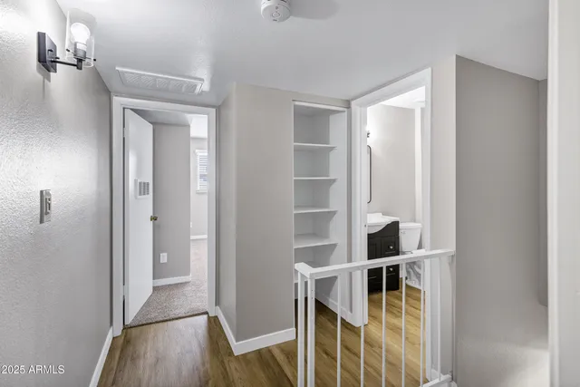 a view of entryway with wooden floor